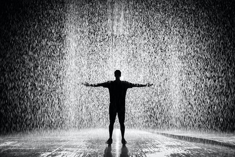 a man standing in rain